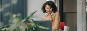 Women on computers, happy using Bill360